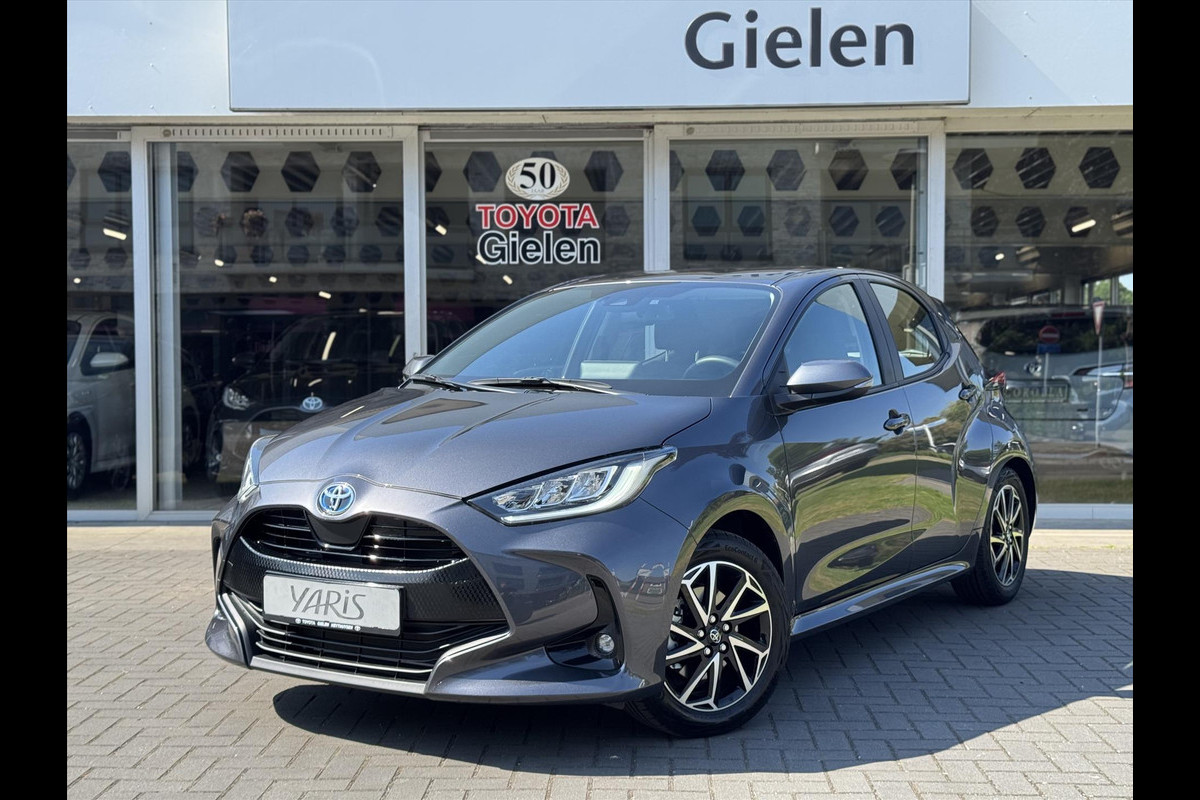 Toyota Yaris 1.5 Hybrid Dynamic Plus | Stoelverwarming, Keyless, LED, Lichtmetalen velgen, Parkeercamera, Adaptive cruise control Toyota Yaris 1.5 Hybrid Dynamic Plus | Stoelverwarming, Keyless, LED, Lichtmetalen velgen, Parkeercamera, Adaptive cruise control