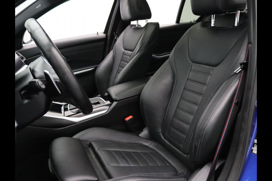 BMW 3-serie 184pk 320i High Executive Camera | Adapt. Cruise | Navi | Parkeersens. v+a | Stoel-/stuurverw. | Trekhaak