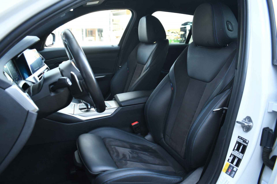 BMW 3 Serie Touring 330e M-Sport Pano Trekhaak H/K 19inch