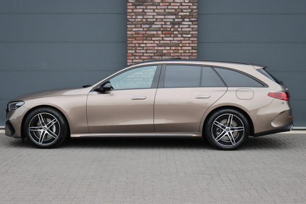 Mercedes-Benz E-Klasse 300 e AMG Line Aut9 | MBUX Hyperscreen | Distronic+ | Burmester | Panoramadak | Memory | 3D-Display | Trekhaak | Digital Light | HUD | Surround Camera |