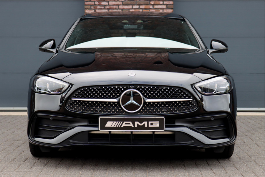 Mercedes-Benz C-Klasse 300 e 4MATIC AMG Line Aut9 | Panoramadak | Distronic+ | Verwarmd Stuurwiel | Stoelverwarming Achter | Surround Camera | Nightpakket | High Perf. LED |