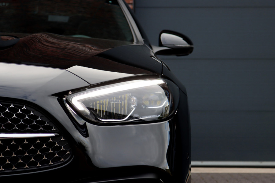 Mercedes-Benz C-Klasse 300 e 4MATIC AMG Line Aut9 | Panoramadak | Distronic+ | Verwarmd Stuurwiel | Stoelverwarming Achter | Surround Camera | Nightpakket | High Perf. LED |
