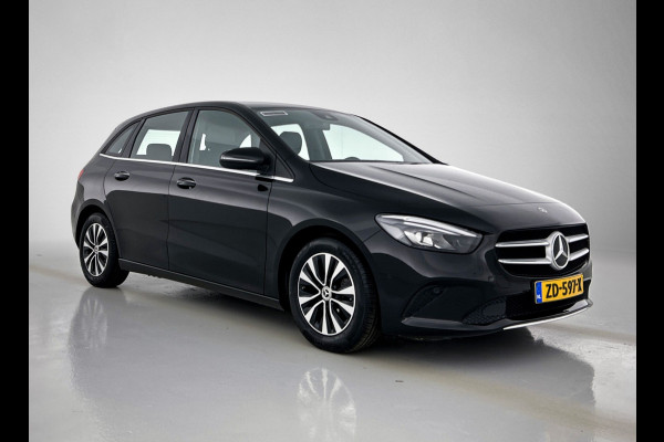 Mercedes-Benz B-Klasse 180 Business Solution | Achteruitrijcamera | Lichtmetalen velgen | Navigatie | Parking support | Trekhaak | Electrisch achterklep Inclusief 24 maanden MB Certified garantie voor Europa.