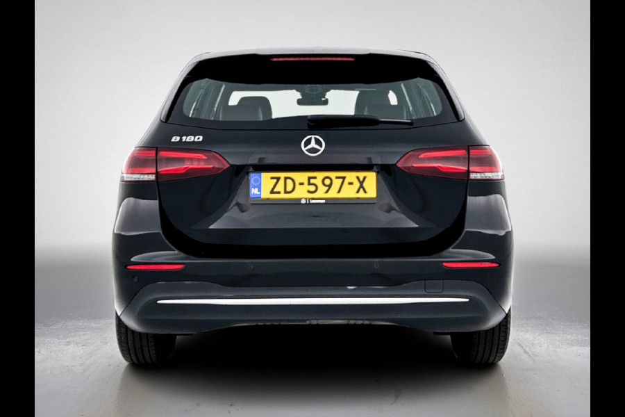 Mercedes-Benz B-Klasse 180 Business Solution | Achteruitrijcamera | Lichtmetalen velgen | Navigatie | Parking support | Trekhaak | Electrisch achterklep Inclusief 24 maanden MB Certified garantie voor Europa.