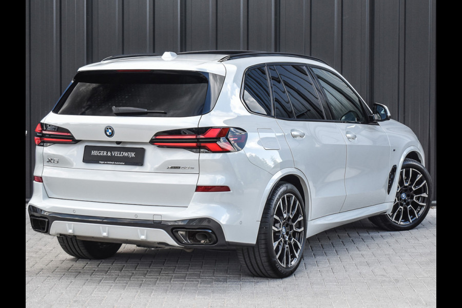 BMW X5 xDrive50e | M-SPORT | PANORAMADAK | LUCHTVERING | DRIVING ASSISTANT | ACTIVE CRUISE | COMFORT ACCESS | ICONIC GLOW | COMFORT SEA