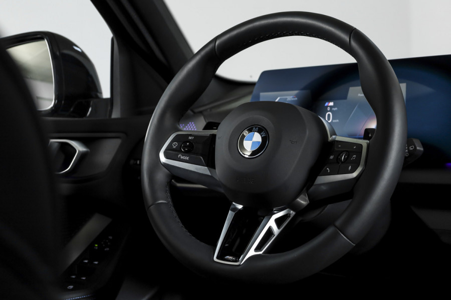 BMW 1-serie 120 M Sport (Nieuw Model) - Automaat | Dig. Cockpit | Adapt. Cruise | Stoelverw. | PDC | Camera | NAV + App. Connect | ECC | DAB | LM 18" | 0295