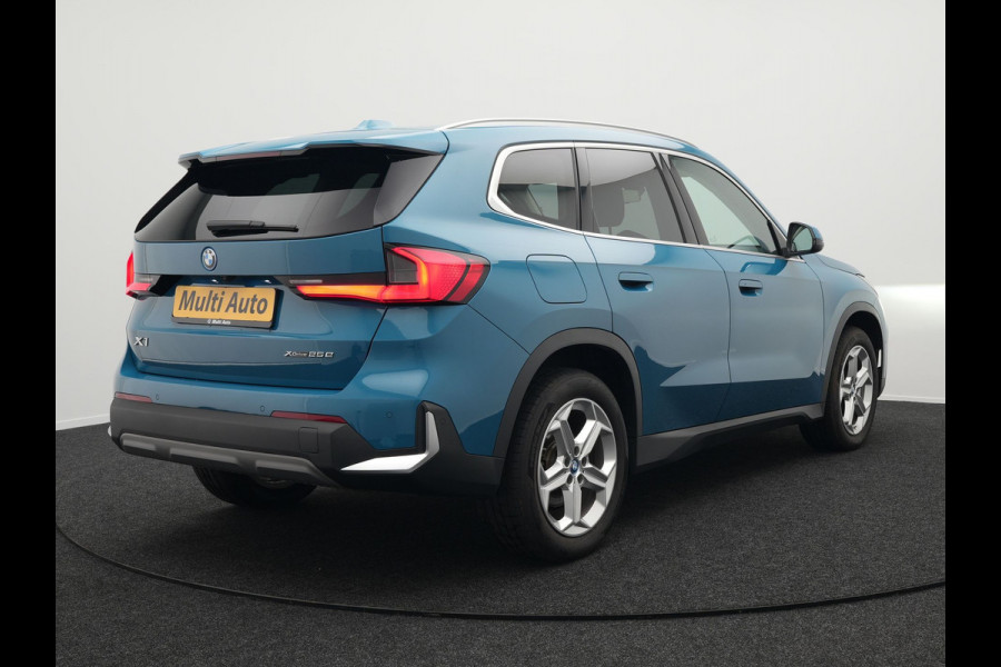 BMW X1 xDrive25e Plug In Hybrid 245pk Dealer O.H PHEV | Trekhaak af Fabriek | Adaptive Cruise | Sportstoelen Memory | Stuur & Stoelverwarming | Harman Kardon | Widescreen Navi | Sfeerverlichting | Keyless |