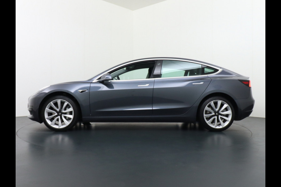 Tesla Model 3 RWD SR+ 60kWh 325PK 19" FSD-3 Computer AutoPilot Leder PanoDak Adaptive-Cruise Lmv 18" Camera's Elektr.-Stuur+Stoelen+Spiegels+G Navi LED Comfortstoelen ACC DAB Voorverwarmen interieur via App Keyless via Telefoonsleutel One-Pedal-Drive Origineel Nederlandse auto tot 11kw laden thuis! Garantie Accu tot  11-12-2027 max 160.000km 1.584kg licht!