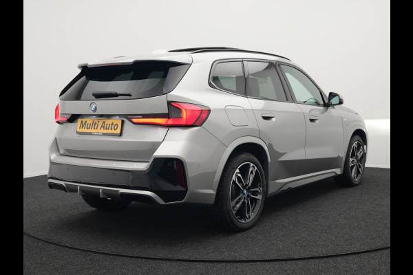 BMW X1 xDrive30e M Sport Plug In Hybrid 326pk PHEV | Trekhaak af Fabriek | Panodak | Adaptive Cruise | Widescreen Navi | 360 Camera | Alcantara Sportstoelen Massage & Memory | Harman Kardon |