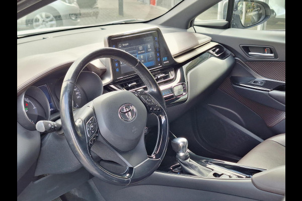 Toyota C-HR 1.8 Hybrid Executive | LED Pakket, Dodehoekherkenning, Navigatie, Stoel + Stuurverwarming, Keyless, Leer/Stof, 18 inch