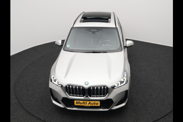 BMW X1 xDrive30e M Sport Plug In Hybrid 326pk PHEV | Trekhaak af Fabriek | Panodak | Adaptive Cruise | Widescreen Navi | 360 Camera | Alcantara Sportstoelen Massage & Memory | Harman Kardon |