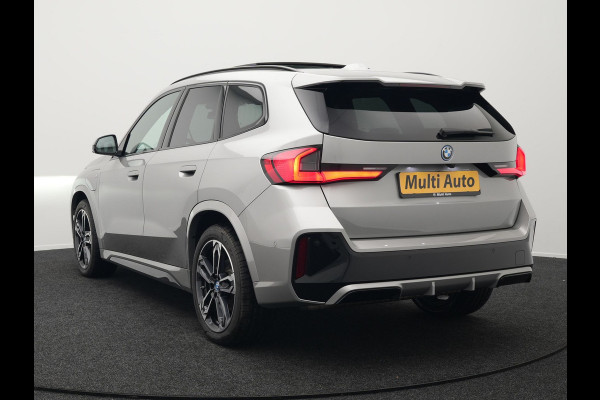 BMW X1 xDrive30e M Sport Plug In Hybrid 326pk PHEV | Trekhaak af Fabriek | Panodak | Adaptive Cruise | Widescreen Navi | 360 Camera | Alcantara Sportstoelen Massage & Memory | Harman Kardon |