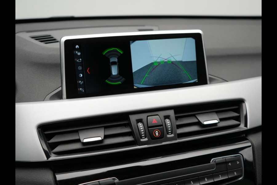 BMW X1 xDrive25e Sportline Plug In Hybrid 220pk PHEV | Adaptive Cruise | Trekhaak Afn. | Camera | Sportstoelen Verwarmd | Navi Pro | DAB | El. Achterklep |