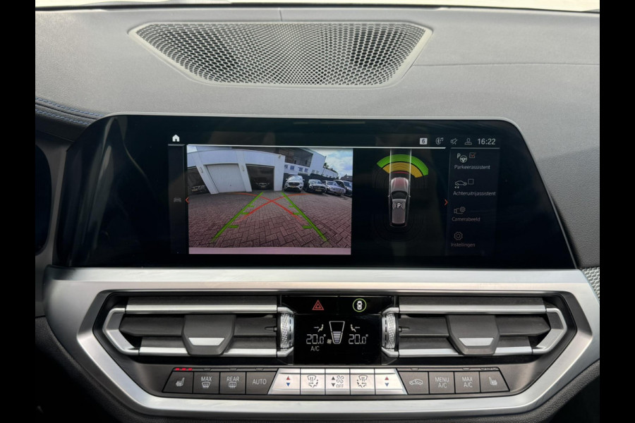BMW 3 Serie Touring 320i High Exec. M-Sport individual Sfeer Leder Camera Pdc v+a Trekhaak Led