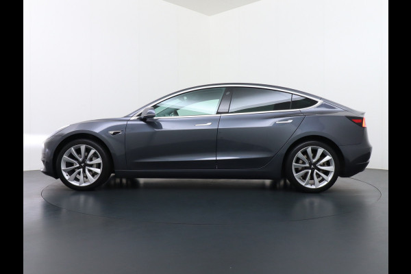 Tesla Model 3 RWD SR+ 60kWh 325PK FSD 2.5-Computer Priv.Glas Lmv 19" AutoPilot Leder PanoDak Adaptive-Cruise Lmv Camera's Elektr.-Stuur+Stoele Navi LED Comfortstoelen ACC DAB GSM-Sleutel+Voorverwarmen interieur via App One-Pedal-Drive Origineel Nederlandse auto tot 11kw laden thuis! Garantie Accu tot 30-09-2027 max 160.000km 1.584kg licht! (23 euro belasting p/m)