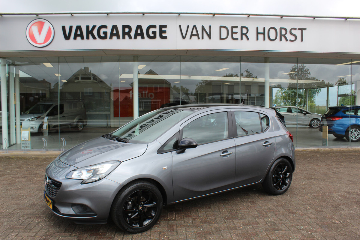 Opel Corsa 1.4-90pk 120 Jaar Edition. Leuke sportieve 5drs. Opel Corsa ! Airco , C|ruise control , Stoel en stuur verwarming , Camera