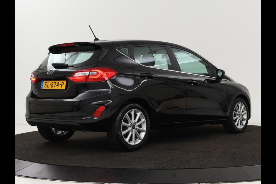 Ford Fiesta 1.0 EcoBoost Titanium | Stoel & stuurverwarming | B&O Sound | Adaptive cruise | Camera | Carplay | Park Assist | Navigatie | Climate control