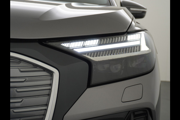 Audi Q4 e-tron 40 204pk 77kWh Adap.Cruise Sport-St. 20" Apple Carplay Android Camera Navi Matrix Led Elek.Achterklep Trekhaak Ecc Stoelverwarmi Audi sound system Assistentiepakketten-Parking/Tour/Plus 1e Eigenaar Origineel Nederlandse Auto 1.000kg trekvermogen € 63.000nieuw