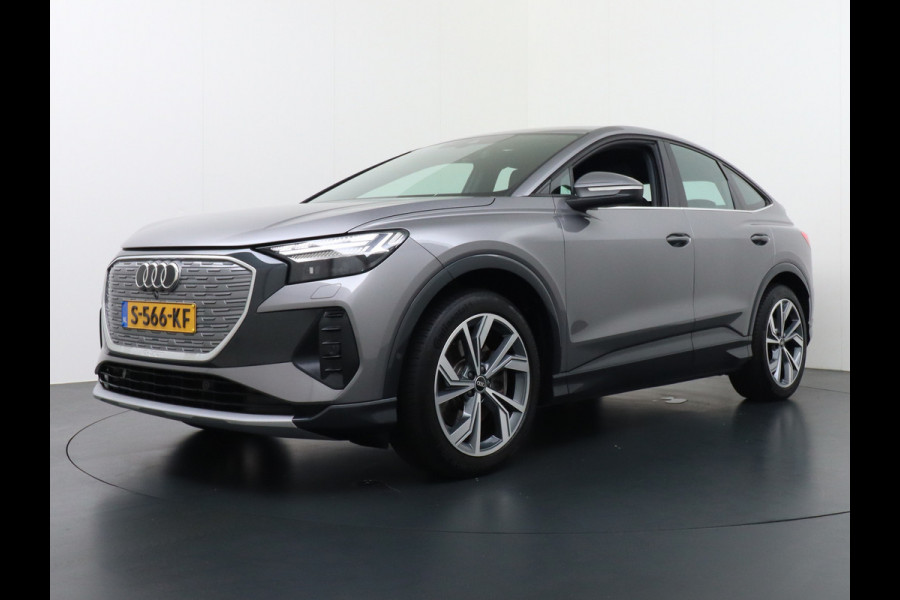 Audi Q4 e-tron 40 204pk 77kWh Adap.Cruise Sport-St. 20" Apple Carplay Android Camera Navi Matrix Led Elek.Achterklep Trekhaak Ecc Stoelverwarmi Audi sound system Assistentiepakketten-Parking/Tour/Plus 1e Eigenaar Origineel Nederlandse Auto 1.000kg trekvermogen € 63.000nieuw