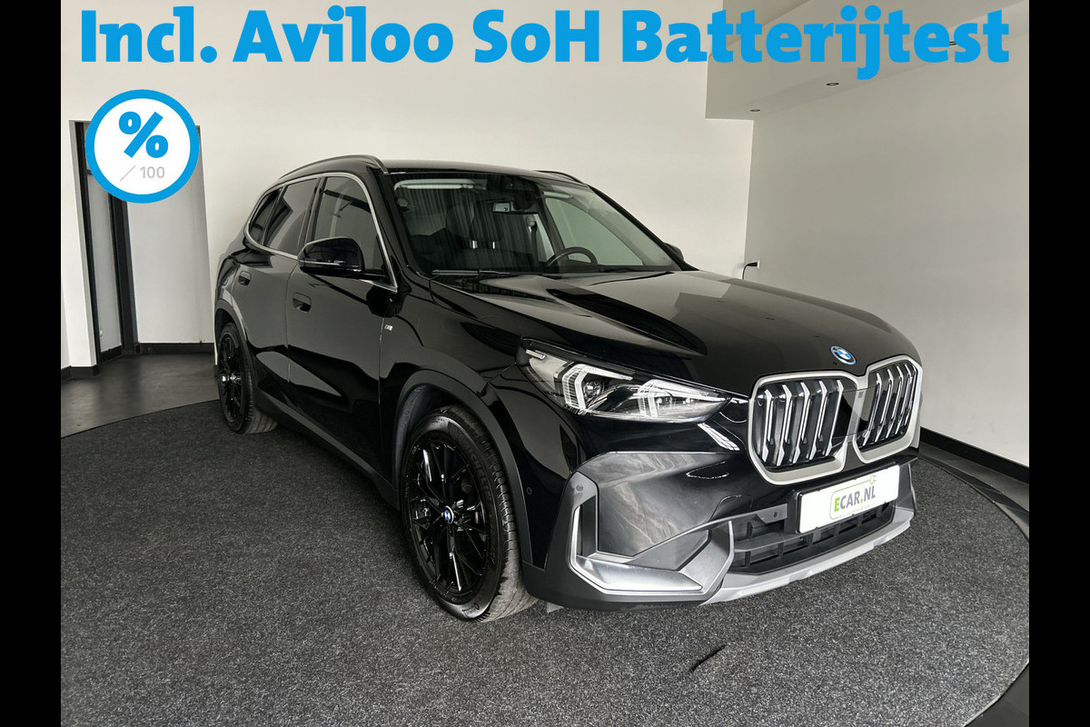 BMW iX1 xDrive30 Launch Edition 67 kWh Privacy Glass | Premium pakket | Comfort Pakket | Achteruitrijcamera | Winterset! | Soh (batterijcheck) 100% BMW iX1 xDrive30 Launch Edition 67 kWh Privacy Glass | Premium pakket | Comfort Pakket | Achteruitrijcamera | Winterset! | Soh (batterijcheck) 100%