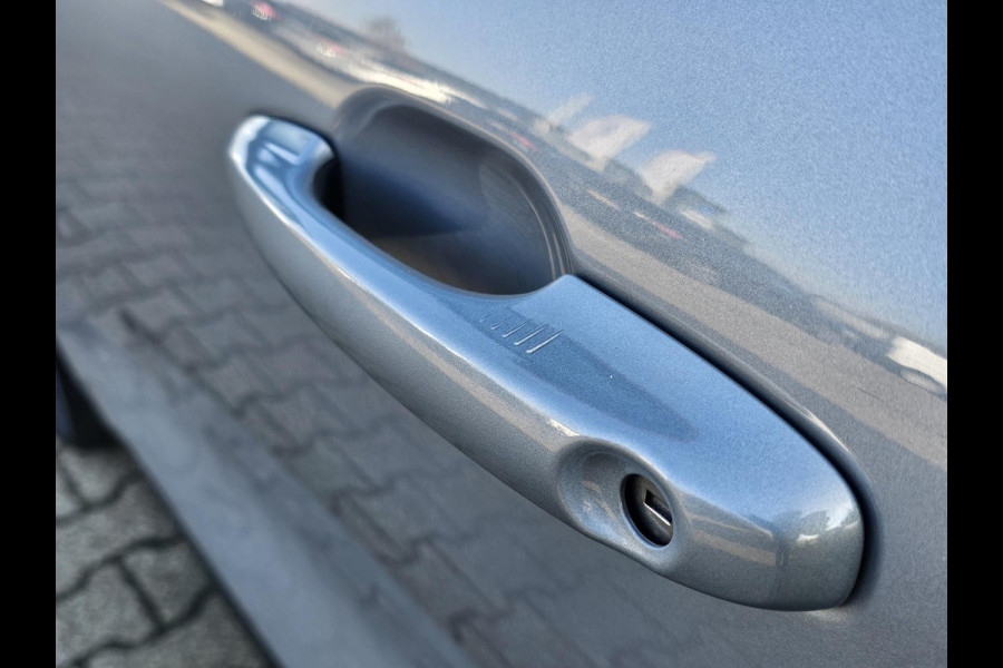 Ford Kuga 2.5 PHEV Titanium X 225pk | Winterpack | Elek. Achterklep | B&O Play | Half Leder | Michelin Cross Climate | 1.500kg Trekgewicht