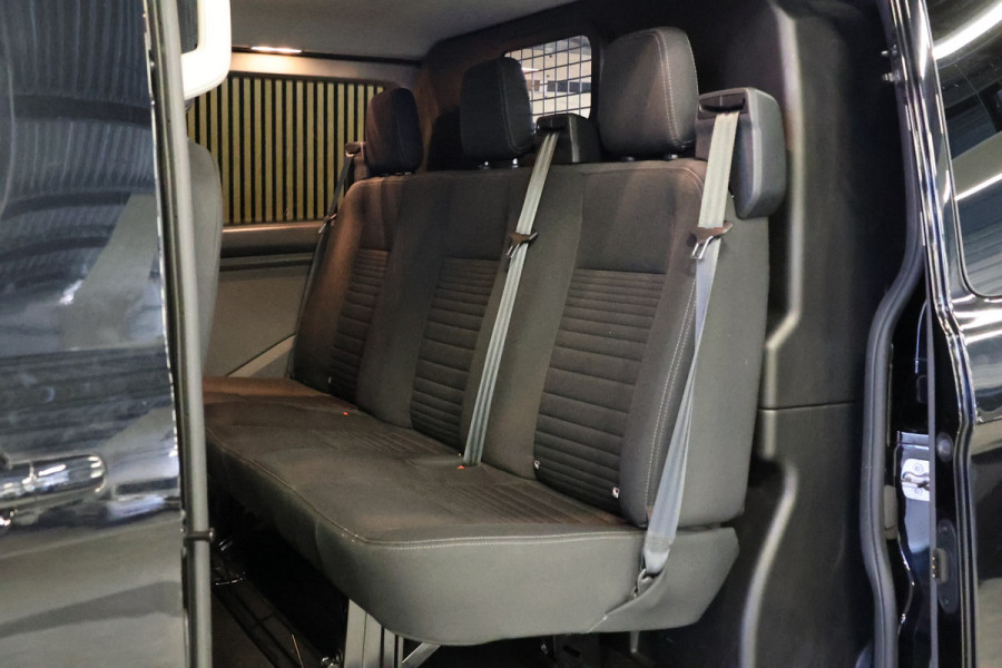 Ford Transit Custom 300 2.0 TDCI L2H1 DC Raptor Edition | 6.500 KM | BPM VRIJ | CarPlay | Lane Assist | DAB | Cruise control | PDC V+A | 6-Zitter | Dubbel Cabine | Betimmering | Nieuwe APK | Fabrieksgarantie