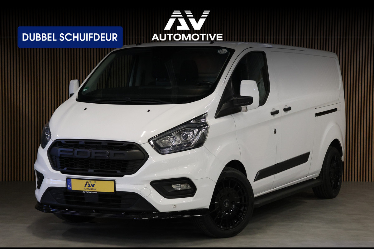Ford Transit Custom 340 2.0 TDCI 190PK L2H1 | L+R Schuifdeur | Navigatie | Blind Spot | CarPlay | Camera | Standkachel | Trekhaak | 3-Zitter | Nieuwe APK | Onderhoudsbeurt