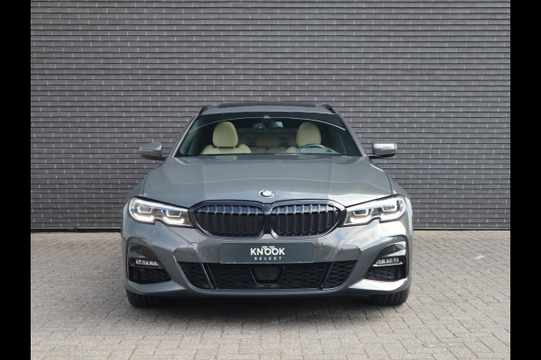BMW 3 Serie Touring 320i High Executive Edition | Head Up | Adaptief Cruise | Panodak |