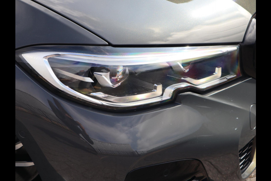 BMW 3 Serie Touring 320i High Executive Edition | Head Up | Adaptief Cruise | Panodak |
