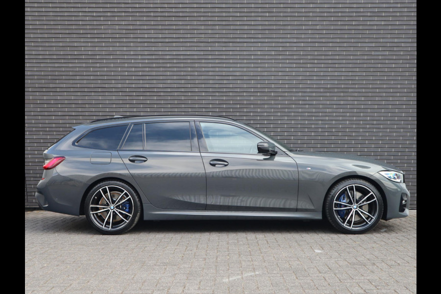 BMW 3 Serie Touring 320i High Executive Edition | Head Up | Adaptief Cruise | Panodak |