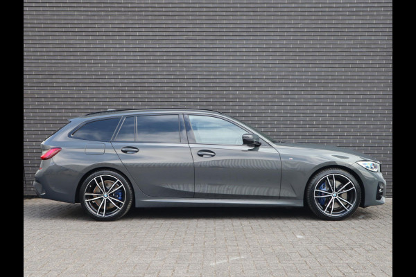 BMW 3 Serie Touring 320i High Executive Edition | Head Up | Adaptief Cruise | Panodak |