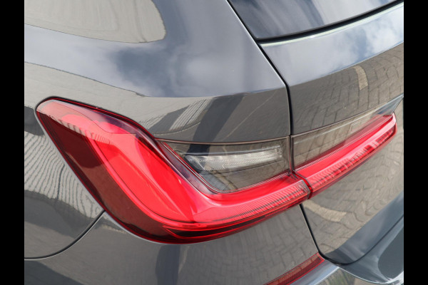 BMW 3 Serie Touring 320i High Executive Edition | Head Up | Adaptief Cruise | Panodak |