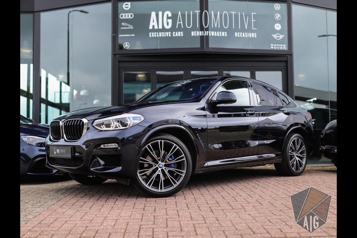 BMW X4 xDrive20i High Executive | M-Sport | Luxe Leder | Pano | Trekhaak | H/K | Camera | Stoelverw. BMW X4 xDrive20i High Executive | M-Sport | Luxe Leder | Pano | Trekhaak | H/K | Camera | Stoelverw.
