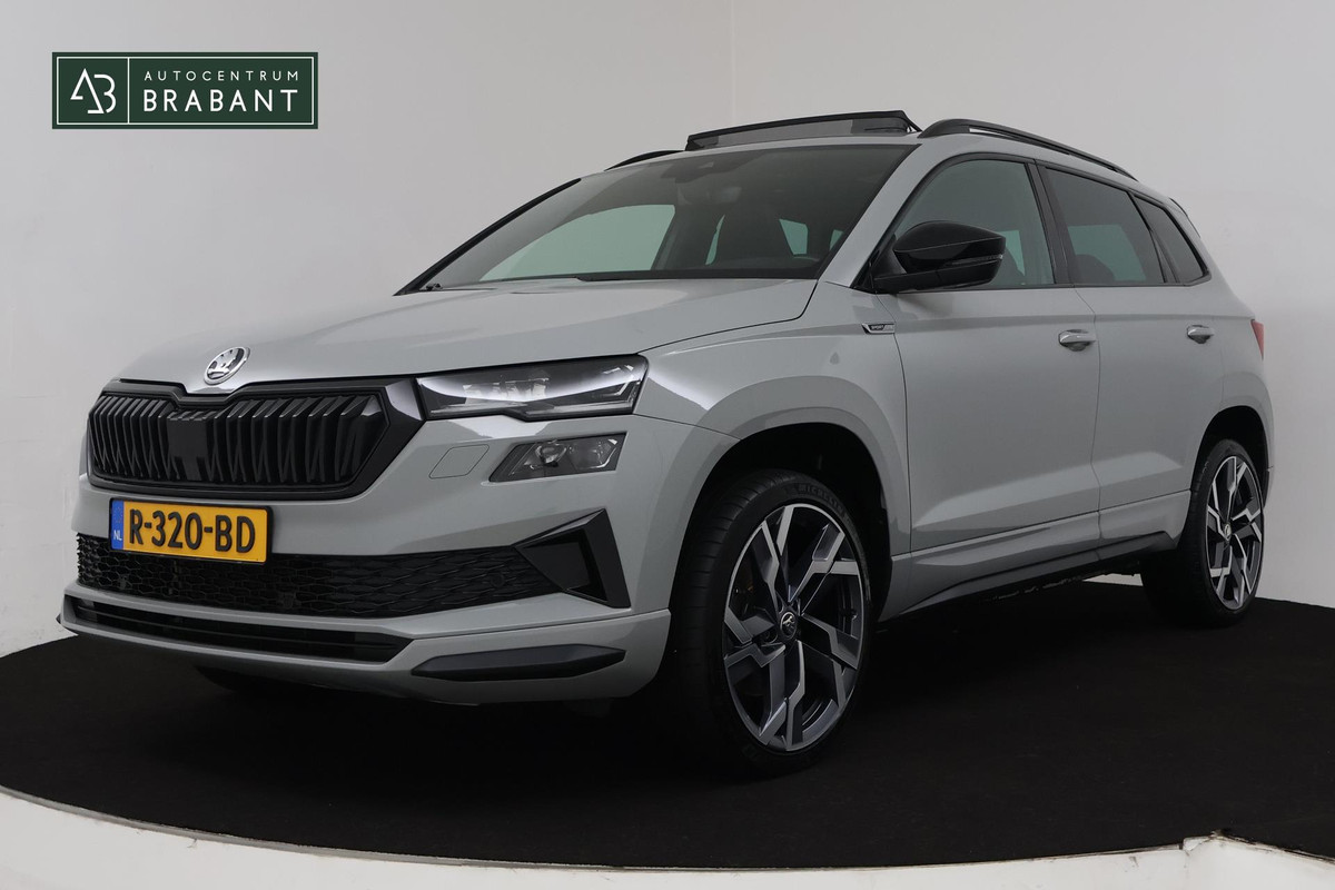 Škoda Karoq 1.5 TSI ACT Sportline Business (PANORAMADAK, STOEL-/STUURVERWARMING, ELEKT. TREKHAAK, ADAPTIVE CRUISE, CAMERA) Škoda Karoq 1.5 TSI ACT Sportline Business (PANORAMADAK, STOEL-/STUURVERWARMING, ELEKT. TREKHAAK, ADAPTIVE CRUISE, CAMERA)