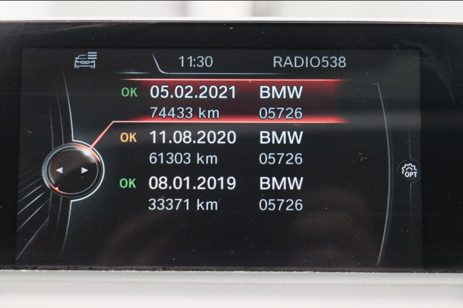 BMW 1-serie 118i High Executive * Trekhaak * Panoramadak Leder Stoelverwarming