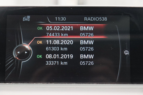 BMW 1-serie 118i High Executive * Trekhaak * Panoramadak Leder Stoelverwarming