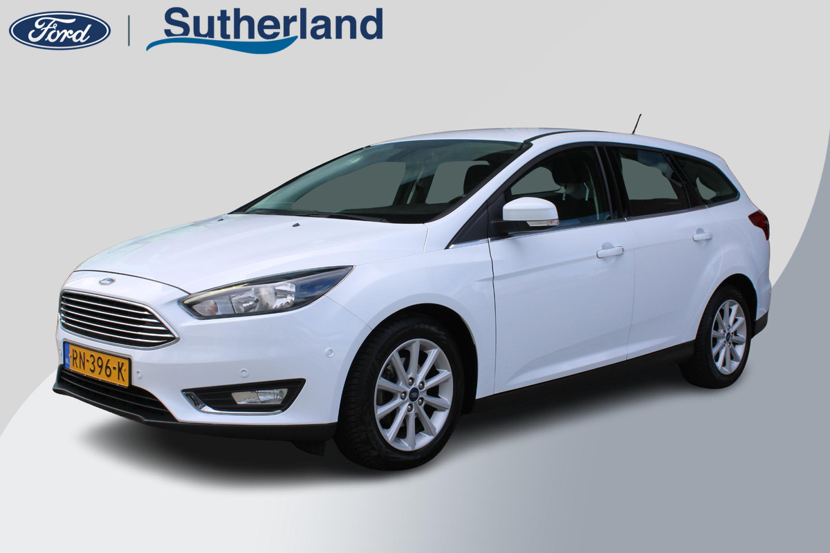 Ford FOCUS Wagon 1.0 EcoBoost Titanium | Navigatie | Climate Control | Cruise Control | Lichtmetalen Velgen | Voorruitverwarming Ford FOCUS Wagon 1.0 EcoBoost Titanium | Navigatie | Climate Control | Cruise Control | Lichtmetalen Velgen | Voorruitverwarming