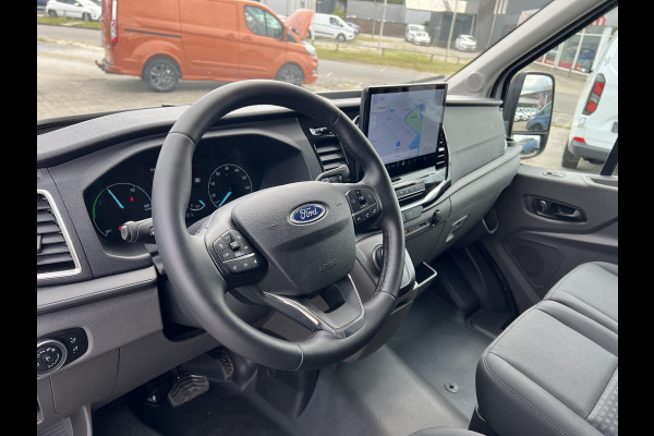Ford E-Transit 350 L3H3 Trend 68 kWh Zuid | 184pk | Pro Power on board | Navigatie | Hoog Dak | Adaptieve Cruise | Digitale binnenspiegel | Keyless entry | Laadruimte bescherming | All season banden | Reservewiel | Perimetrisch alarm