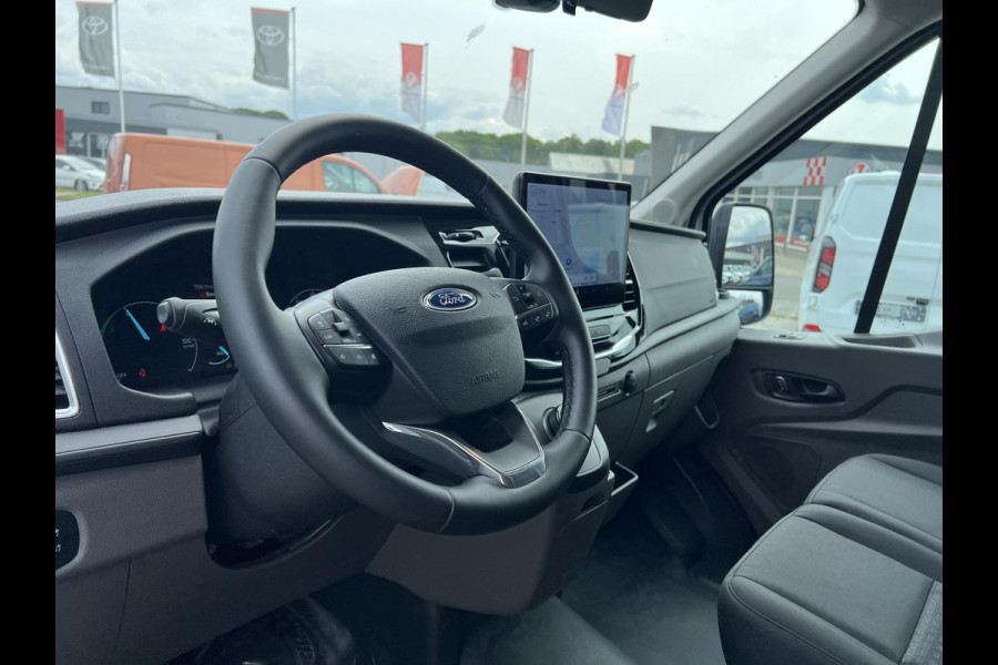 Ford E-Transit 350 L3H3 Trend 68 kWh Zuid | 184pk | Pro Power on board | Navigatie | Hoog Dak | Adaptieve Cruise | Digitale binnenspiegel | Keyless entry | Laadruimte bescherming | All season banden | Reservewiel | Perimetrisch alarm