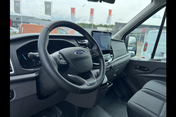 Ford E-Transit 350 L3H3 Trend 68 kWh Zuid | 184pk | Pro Power on board | Navigatie | Hoog Dak | Adaptieve Cruise | Digitale binnenspiegel | Keyless entry | Laadruimte bescherming | All season banden | Reservewiel | Perimetrisch alarm