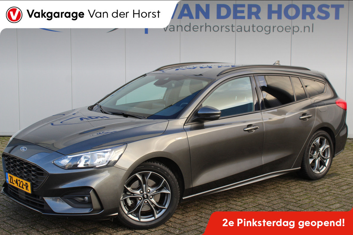Ford FOCUS Wagon 1.0-125pk EcoBoost ST-Line AUTOMAAT ! Heel erg nette en goed onderhouden Ford Focus ST-Line wagon automaat. Volautm. airco dual, stoel-, stuur- en voorraamverw., camera, trekhaak, navigatie, telefoonvoorb., LM wln, cruise cntrl, skiluik etc., etc.... Ford FOCUS Wagon 1.0-125pk EcoBoost ST-Line AUTOMAAT ! Heel erg nette en goed onderhouden Ford Focus ST-Line wagon automaat. Volautm. airco dual, stoel-, stuur- en voorraamverw., camera, trekhaak, navigatie, telefoonvoorb., LM wln, cruise cntrl, skiluik etc., etc....