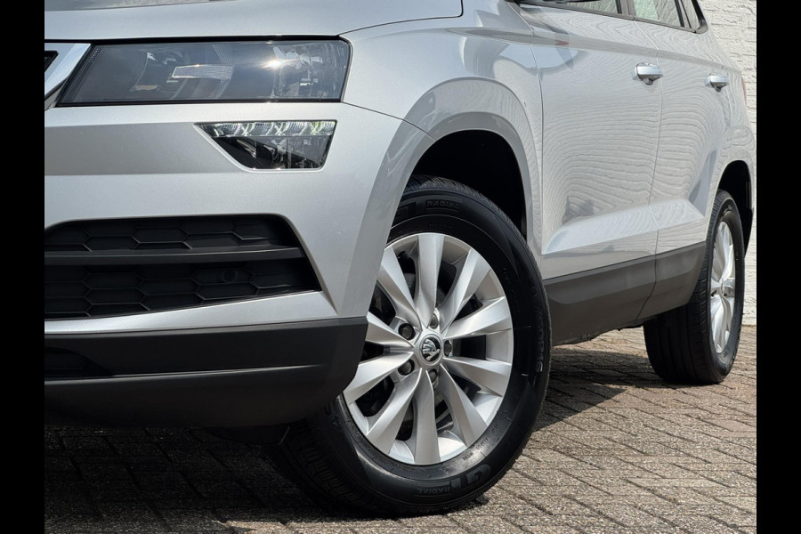 Škoda Karoq 1.0 TSI Style Camera Clima Cruise Trekhaak Inductie laden Navigatie Keyless