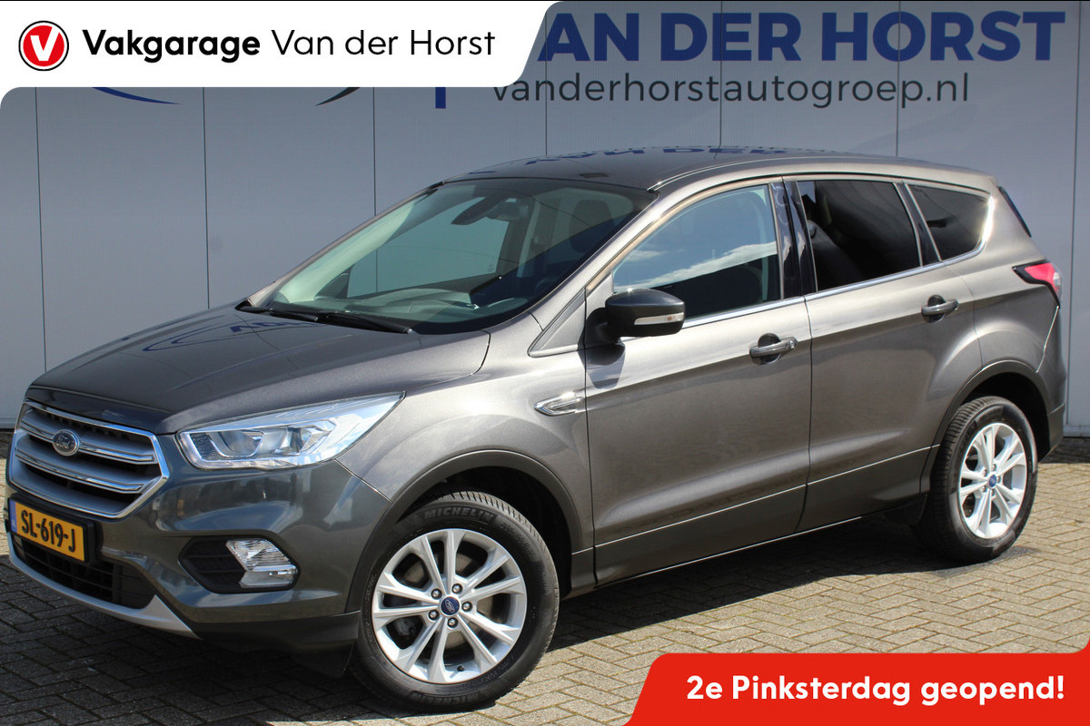 Ford Kuga 1.5-120pk EcoBoost Titanium. Goed onderhouden en erg nette Ford Kuga ! Trekgewicht 1.800kg ! Autm. airco dual, trekhaak, cruise control, metallic lak, voorraamverwarming, LM wielen, parkeersensoren achter, navigatie, telefoonvoorbereiding etc. Ford Kuga 1.5-120pk EcoBoost Titanium. Goed onderhouden en erg nette Ford Kuga ! Trekgewicht 1.800kg ! Autm. airco dual, trekhaak, cruise control, metallic lak, voorraamverwarming, LM wielen, parkeersensoren achter, navigatie, telefoonvoorbereiding etc.