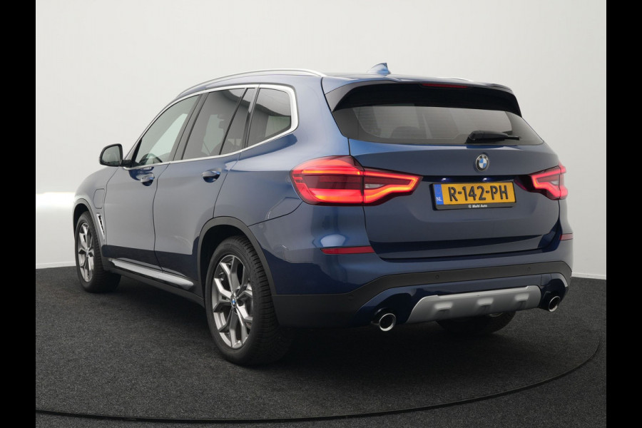 BMW X3 xDrive30e X Line Plug In Hybrid 293pk PHEV | Trekhaak af Fabriek | Adaptive Cruise | Apple Carplay | Sportstoelen Verwarmd | 19"L.M | Sfeerverlichting | Navi Full Map |