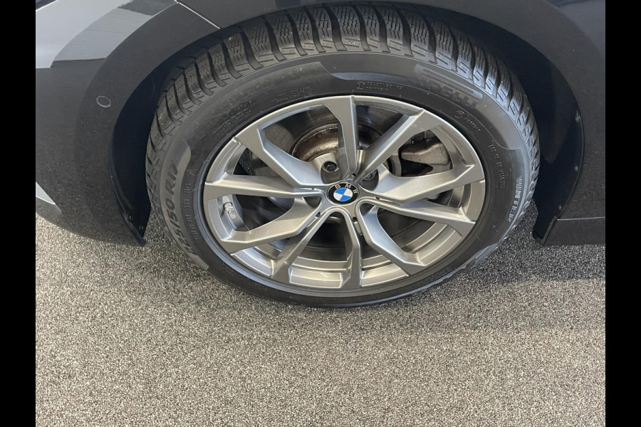 BMW 3 Serie Touring 320e Climate control Adaptive cruise control Parkeersensoren Navigatie LED Apple Carplay/ Android Auto