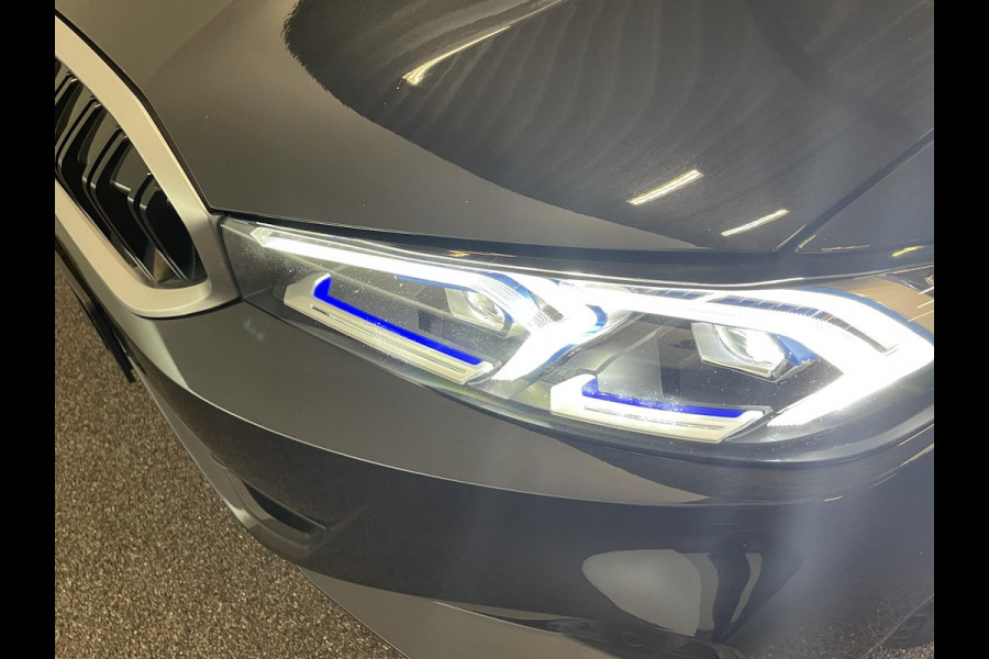 BMW 3 Serie Touring 320e Climate control Adaptive cruise control Parkeersensoren Navigatie LED Apple Carplay/ Android Auto
