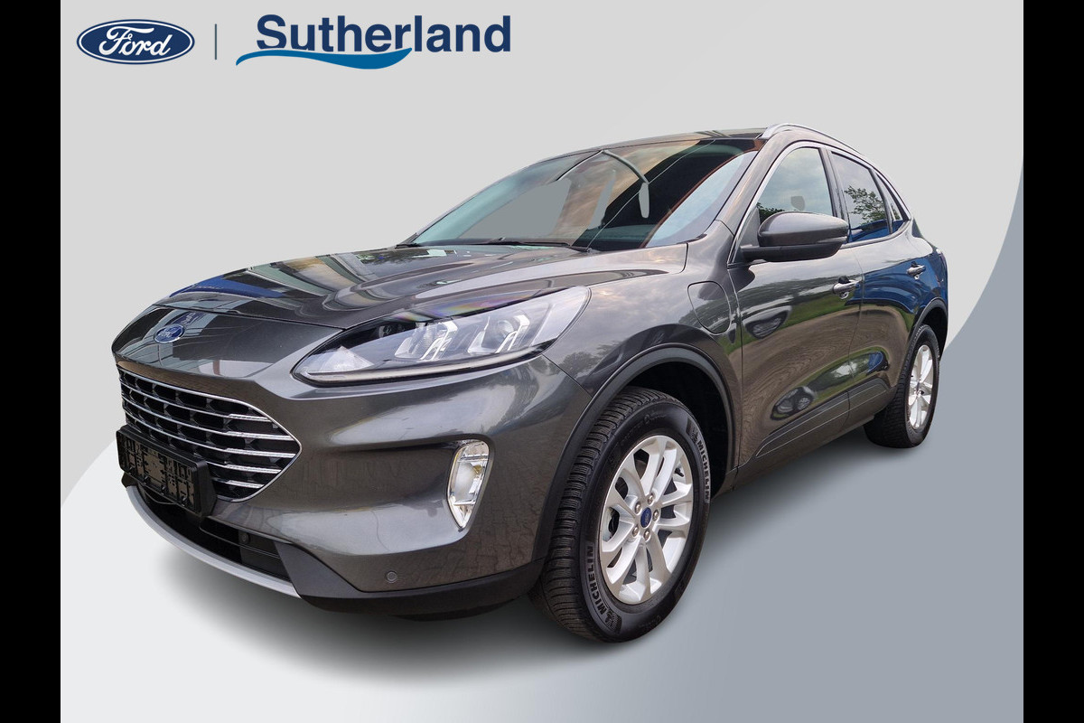 Ford Kuga 2.5 PHEV Titanium 225pk | Winterpack | Trekhaak | 1.500kg geremd | Camera Ford Kuga 2.5 PHEV Titanium 225pk | Winterpack | Trekhaak | 1.500kg geremd | Camera