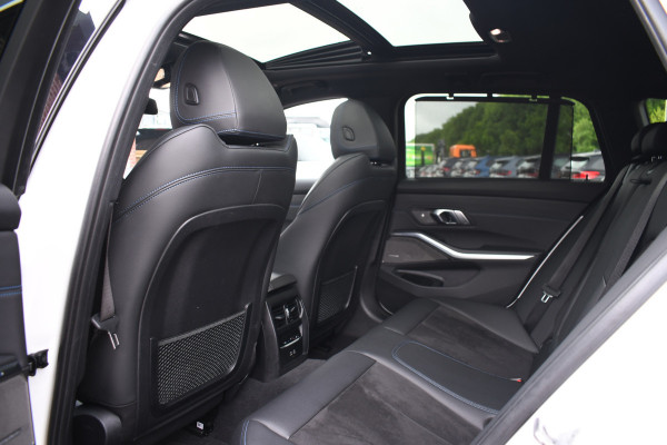 BMW 3 Serie Touring 330e M-Sport Pano Trekhaak Harman/K 19inch Camera