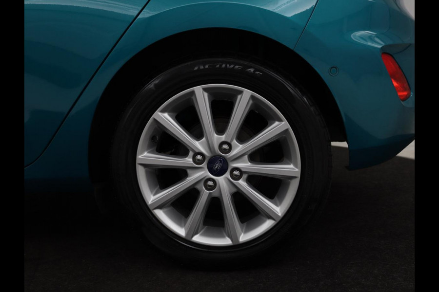 Ford Fiesta 1.0 EcoBoost Titanium | 54.100km NAP | Camera | Carplay | Adaptive cruise | B&O Sound | Verwarmde voorruit | Park Assist | Climate control
