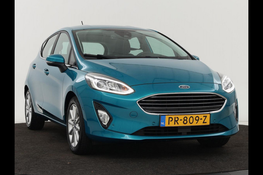 Ford Fiesta 1.0 EcoBoost Titanium | 54.100km NAP | Camera | Carplay | Adaptive cruise | B&O Sound | Verwarmde voorruit | Park Assist | Climate control